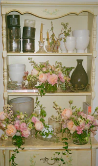 a hutch with flowers on it
